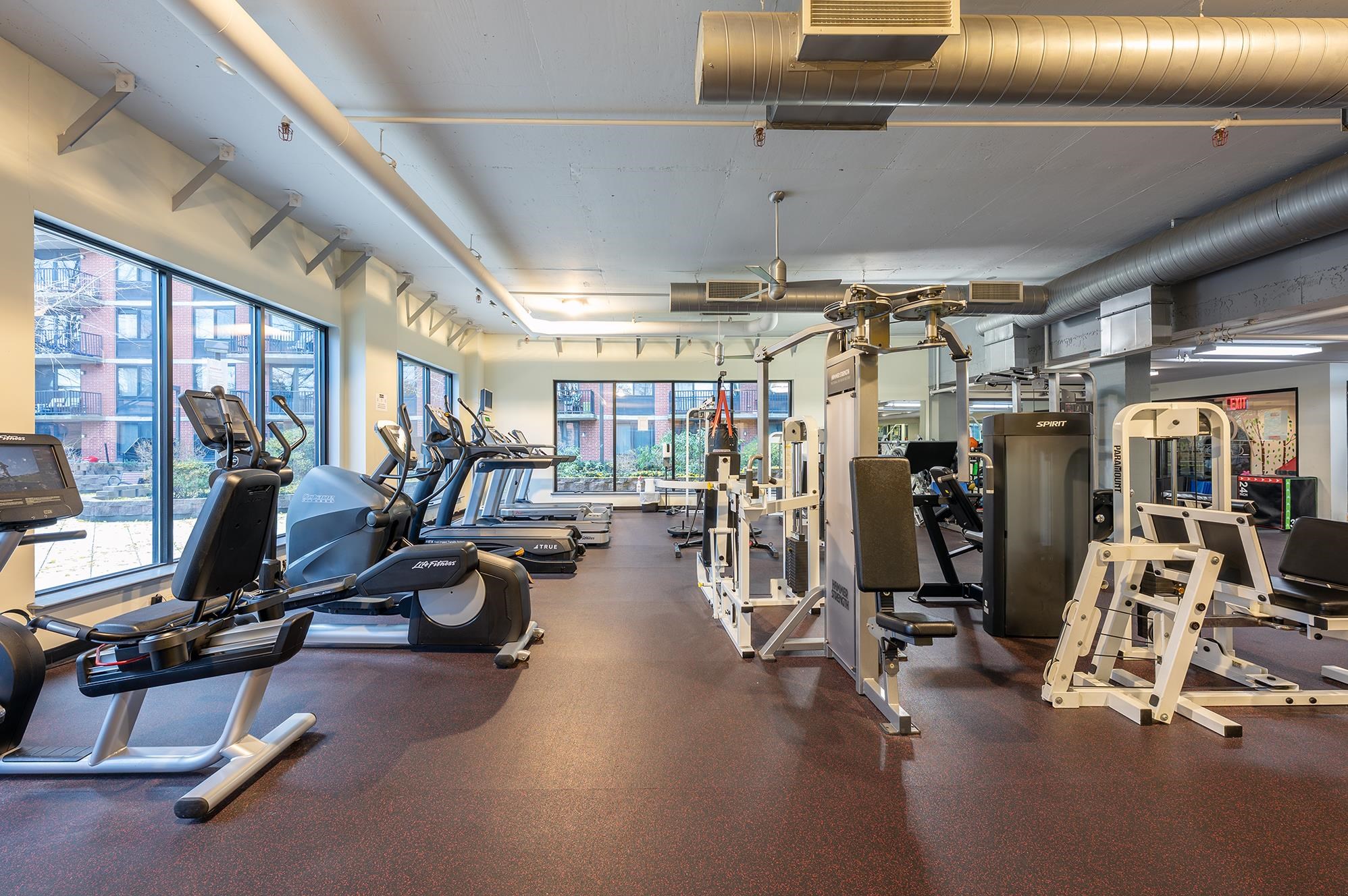 700 Grove Street, Unit 10A Jersey City, NJ 07310 - Photo 23 of 24 a view of a room with gym equipment
