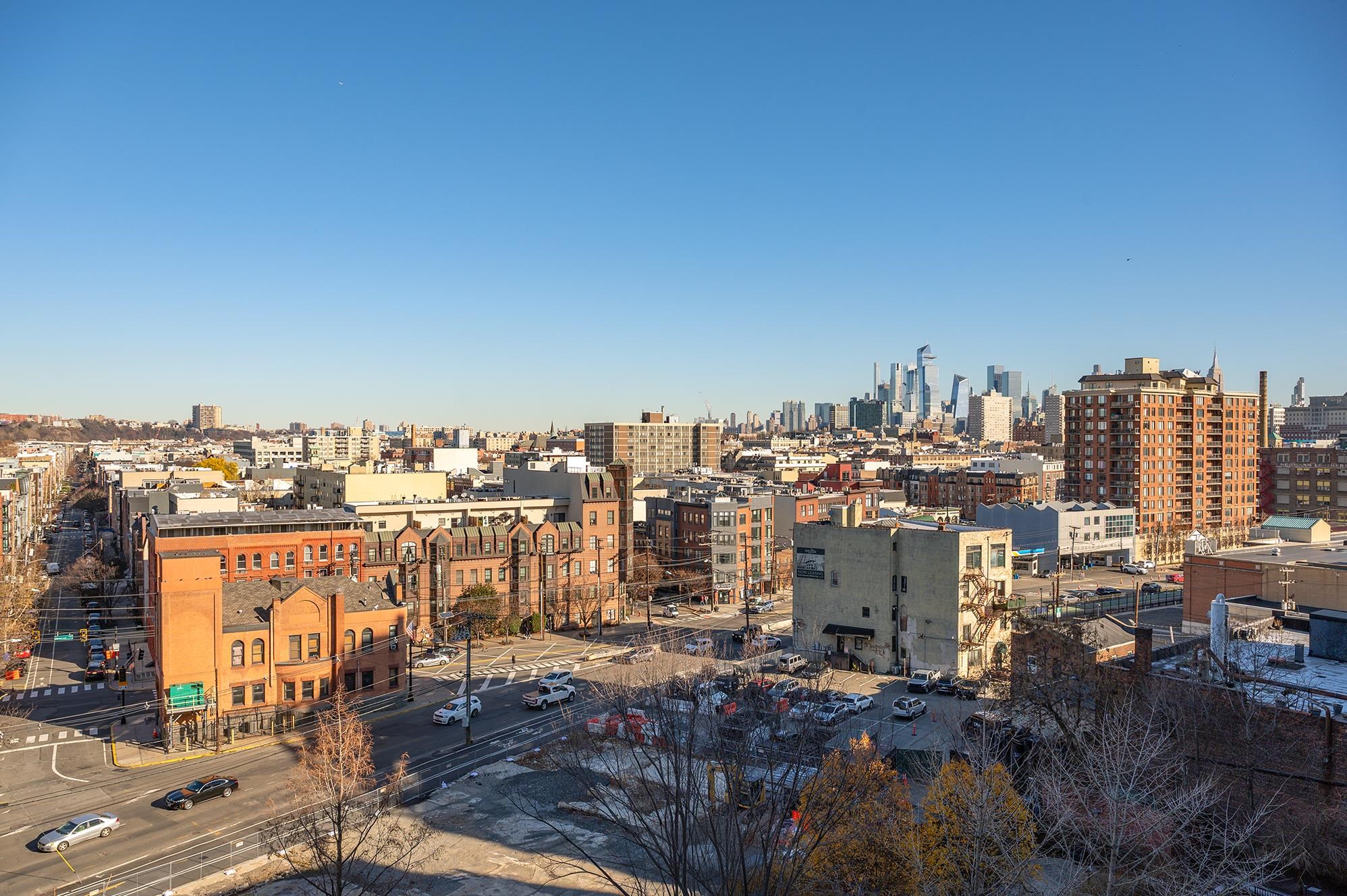 700 Grove Street, Unit 10A Jersey City, NJ 07310 - Photo 10 of 24 a view of a city with tall buildings