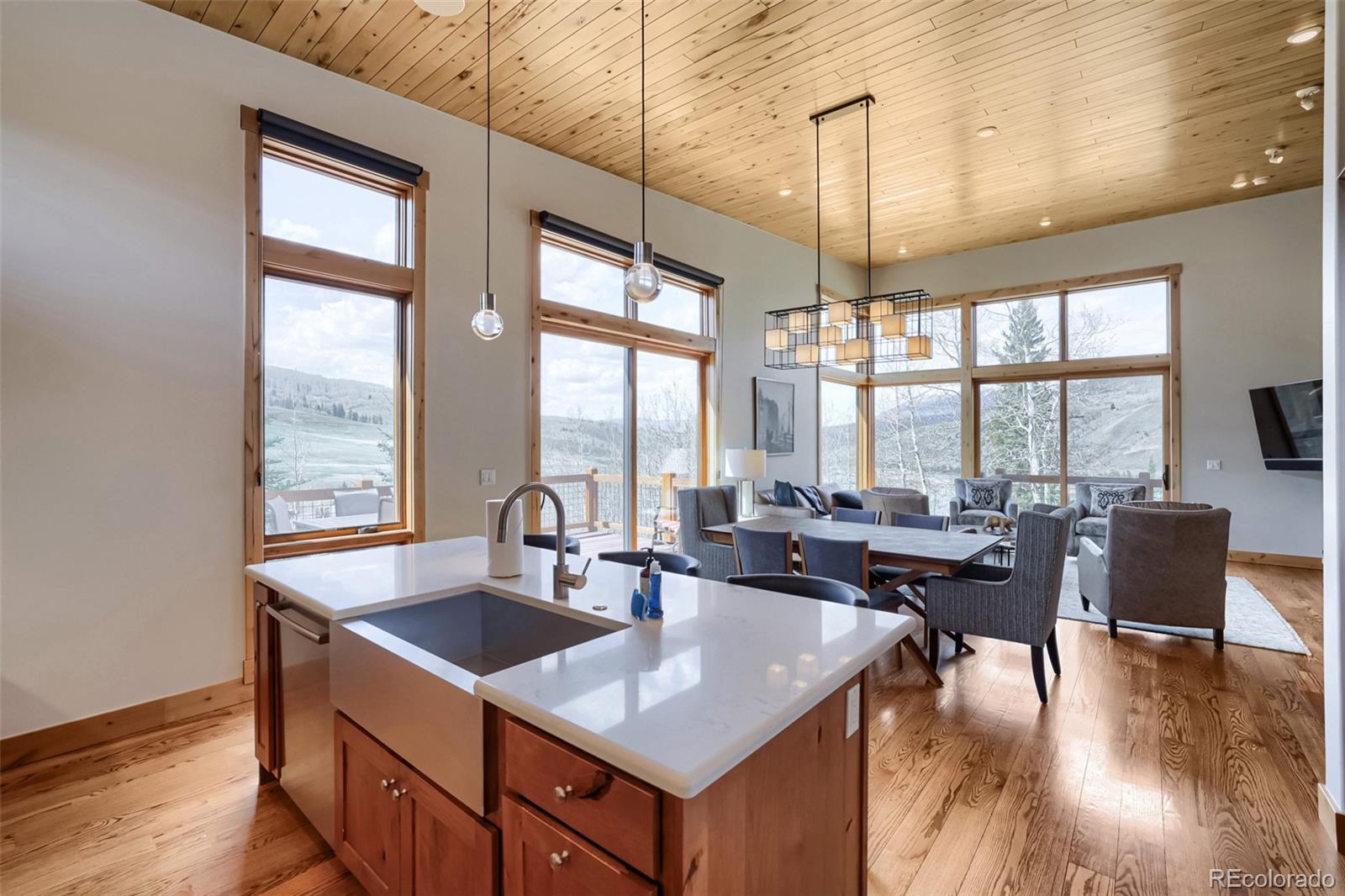 836 Maryland Creek Road Silverthorne, CO 80498 - Photo 8 of 49 a room with lots of furniture and a large window