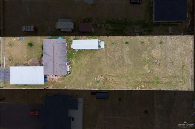 a view of kitchen island with stainless steel appliances