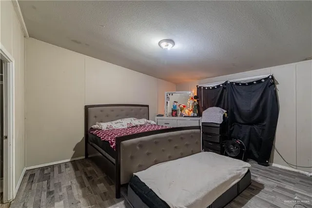 a bed room with a bed and a table