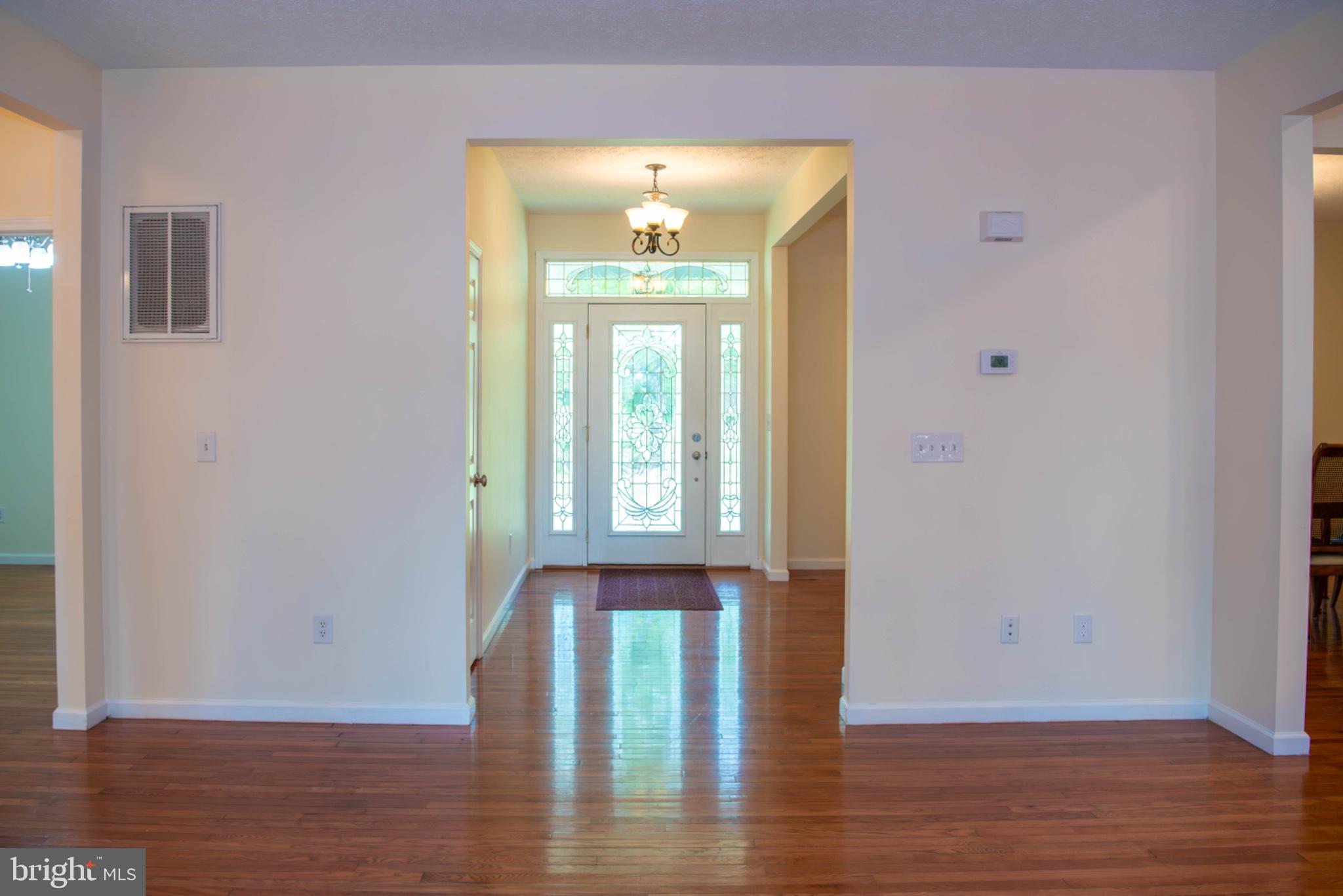 792 Forest Glen Road Moorefield, WV 26836 - Photo 21 of 146 Inviting entryway with natural light.