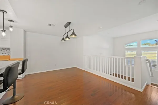 a view of a room with windows