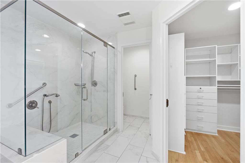 2660 Peachtree Road Northwest, Unit 9G Atlanta, GA 30305 - Photo 24 of 42 a bathroom with a shower