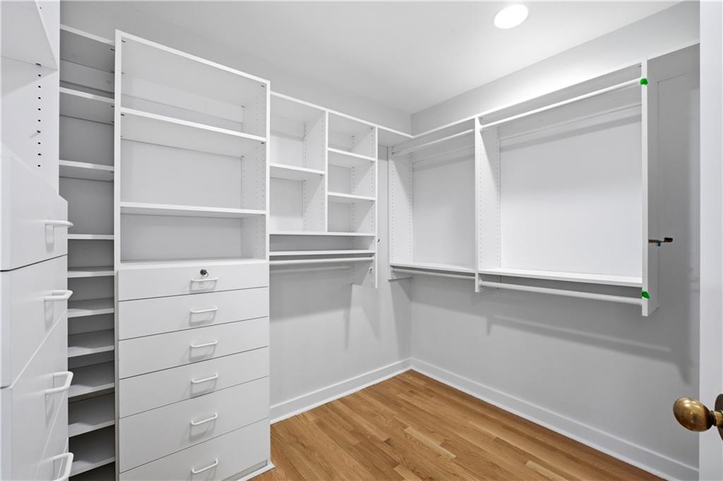 2660 Peachtree Road Northwest, Unit 9G Atlanta, GA 30305 - Photo 26 of 42 a view of walk in closet with empty racks