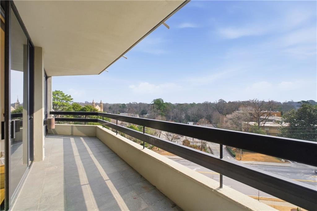 2660 Peachtree Road Northwest, Unit 9G Atlanta, GA 30305 - Photo 27 of 42 a view of balcony with furniture and city view