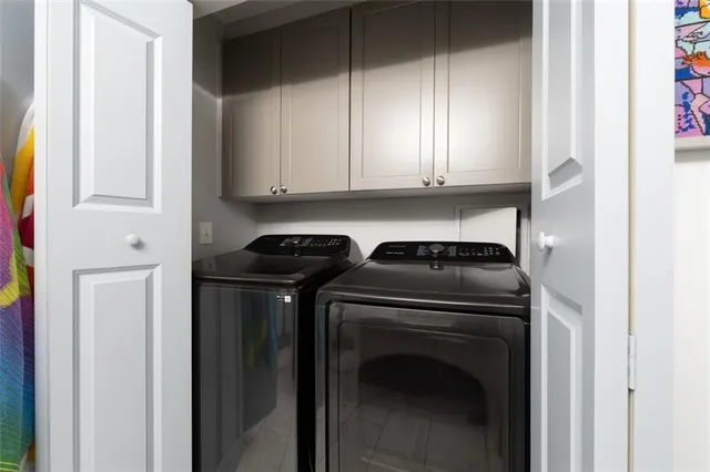 a close up view of washer and dryer