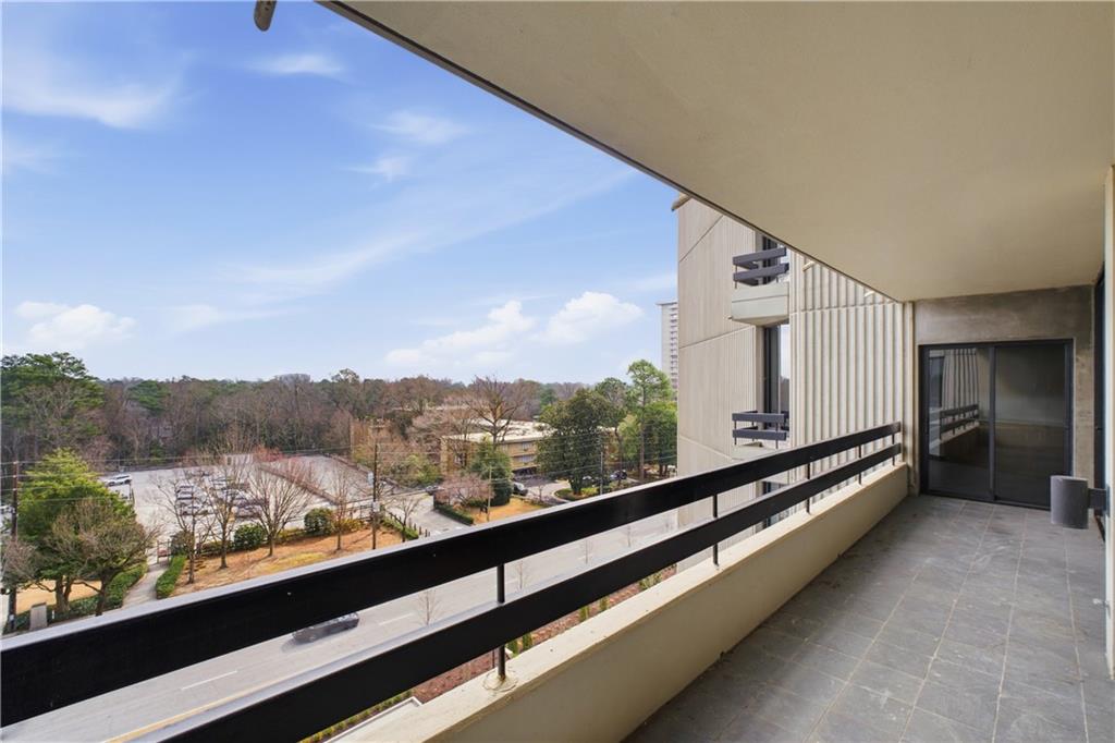 2660 Peachtree Road Northwest, Unit 9G Atlanta, GA 30305 - Photo 29 of 42 a view of city and mountain from a balcony