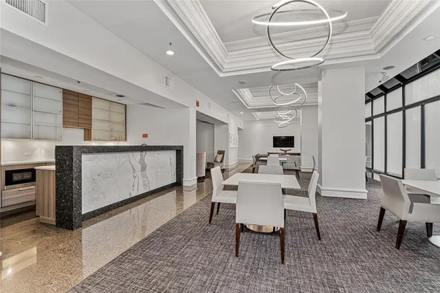 a view of a dining room with furniture