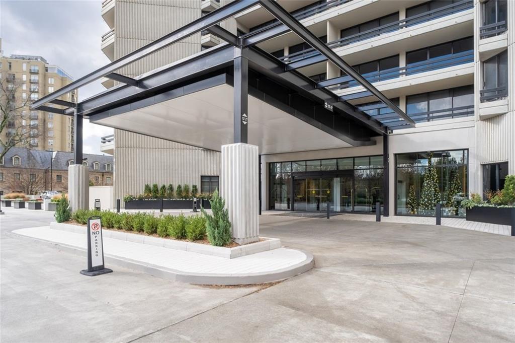 2660 Peachtree Road Northwest, Unit 9G Atlanta, GA 30305 - Photo 35 of 42 a view of a house with a porch