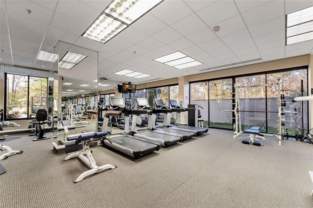 2660 Peachtree Road Northwest, Unit 9G Atlanta, GA 30305 - Photo 36 of 42 a view of a room with gym equipment