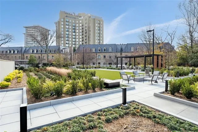 a view of a building with sitting area