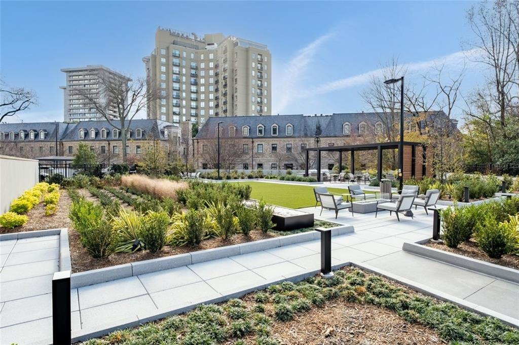 2660 Peachtree Road Northwest, Unit 9G Atlanta, GA 30305 - Photo 40 of 42 a view of a chairs and table in patio