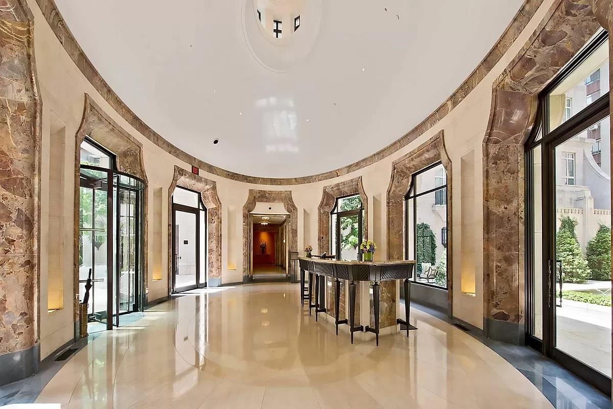 15 Central Park West, Unit 6K Manhattan, NY 10023 - Photo 11 of 13 a view of a livingroom with furniture and floor to ceiling window