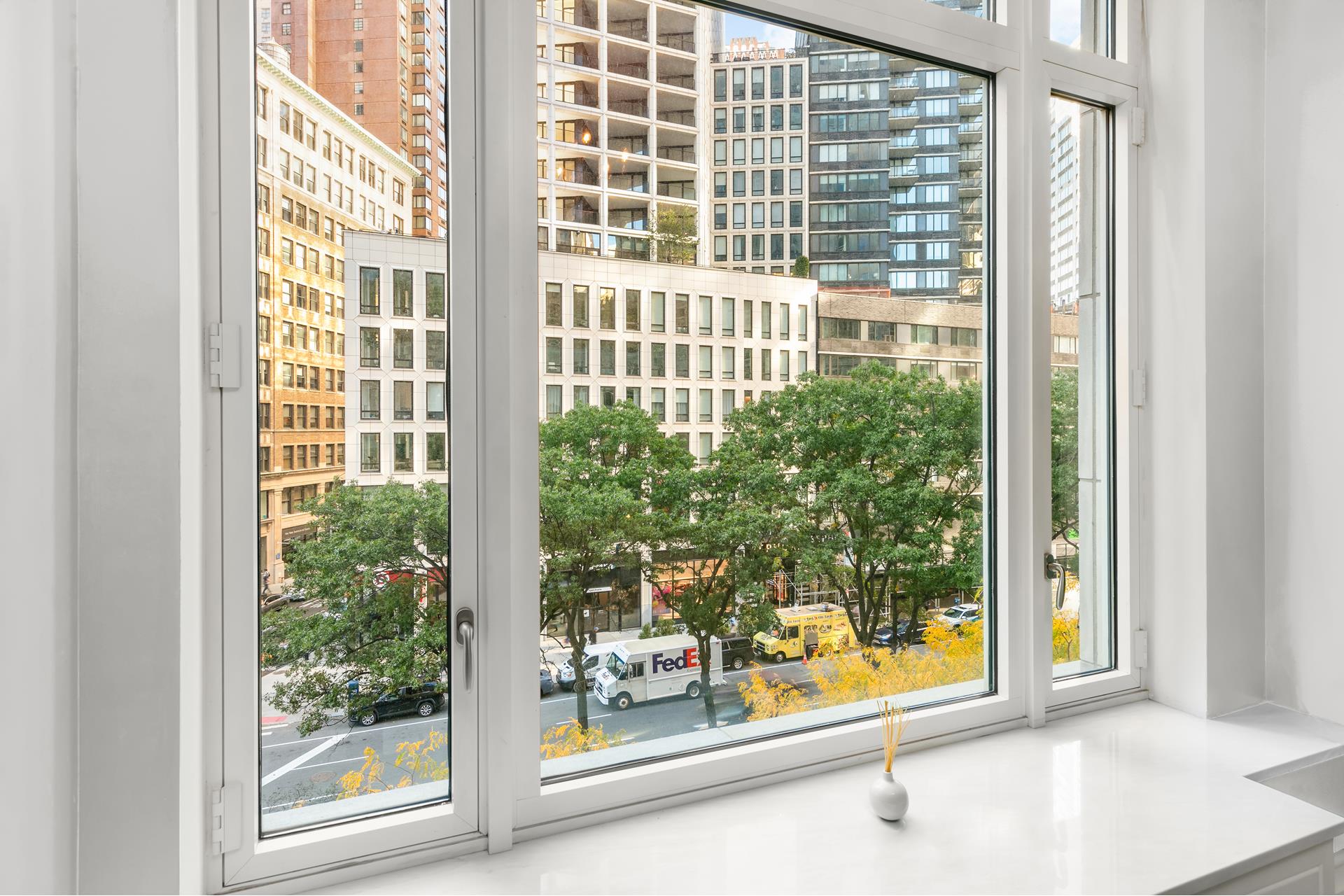 15 Central Park West, Unit 6K Manhattan, NY 10023 - Photo 2 of 13 a view of a glass door with a glass windows