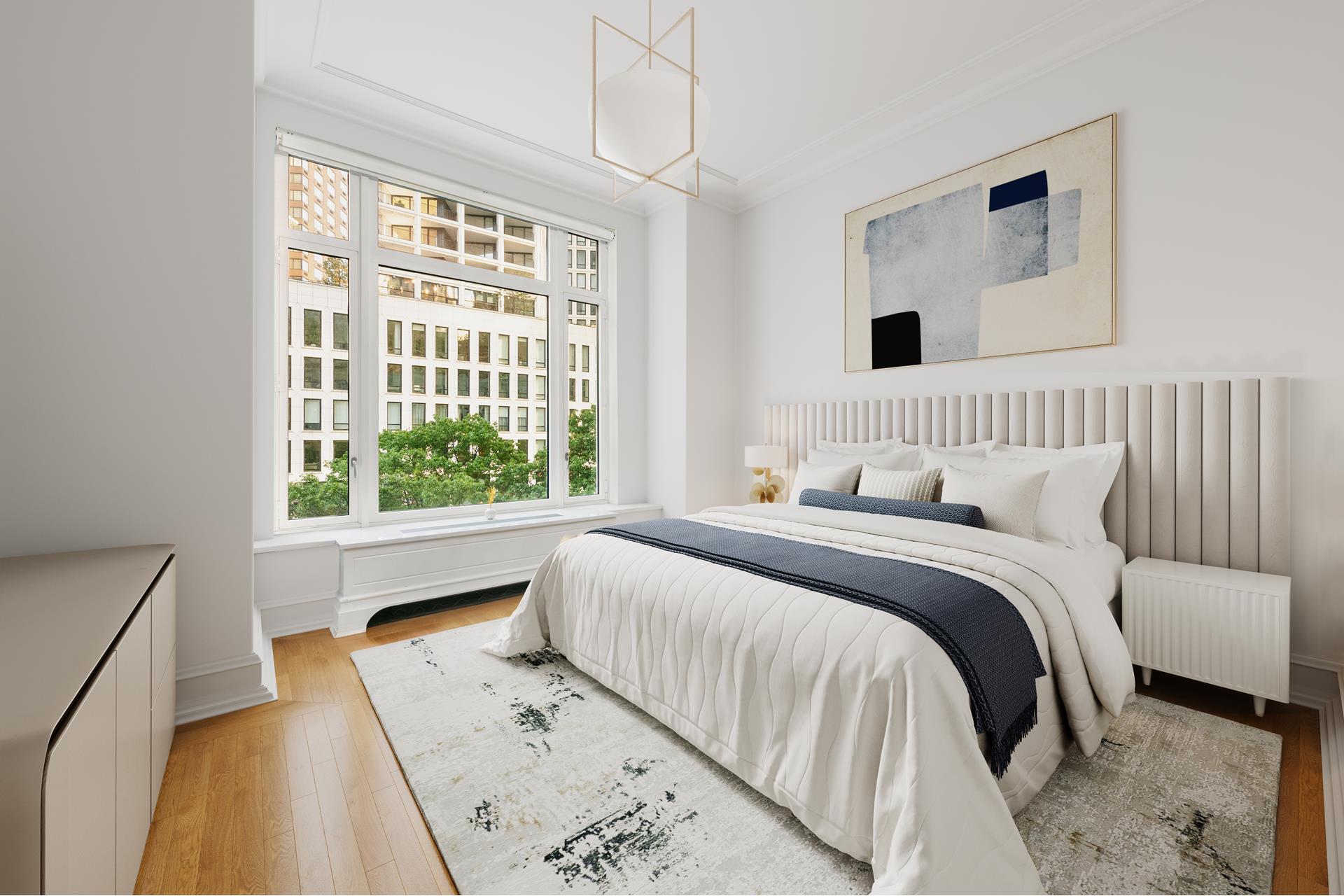 15 Central Park West, Unit 6K Manhattan, NY 10023 - Photo 4 of 13 a bedroom with a bed and a window