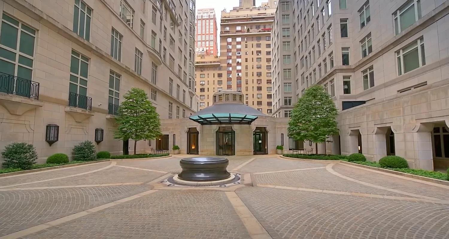 15 Central Park West, Unit 6K Manhattan, NY 10023 - Photo 9 of 13 a view of a building with a yard in front of it