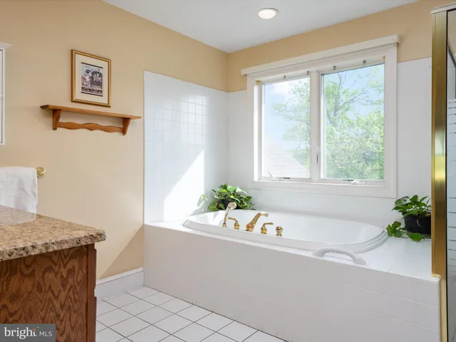 a view of a swimming pool and an outdoor seating