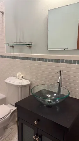 a bathroom with a sink and a toilet