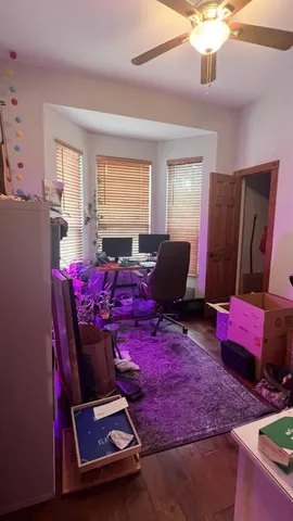 a view of a chairs and table in the patio