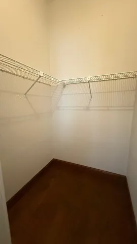 a view of a room with racks on the wall