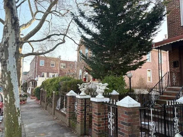 a view of a house with a trees from a patio