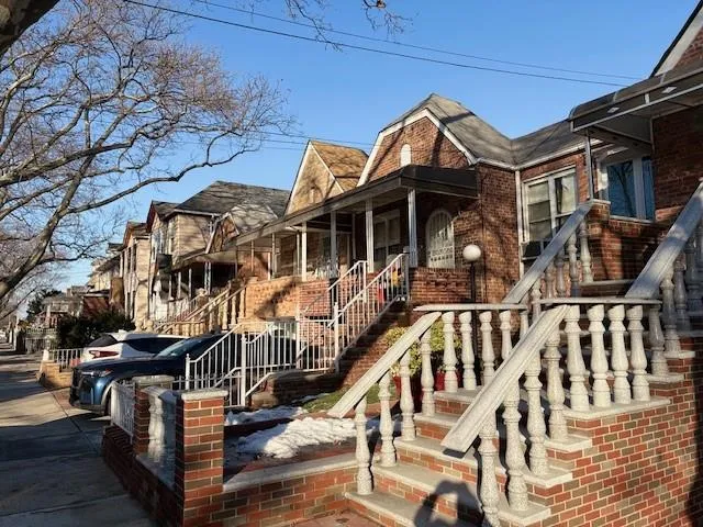 a view of a house with wooden stairs
