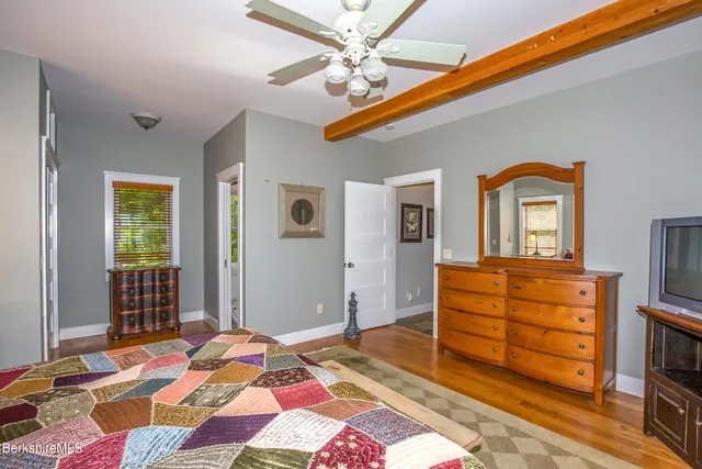 a bathroom with a sink a mirror and a bathtub