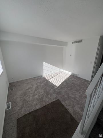 556 North Fairfield Road, Unit D4 Layton, UT 84041 - Photo 20 of 23 Unfurnished room with carpet flooring and baseboards