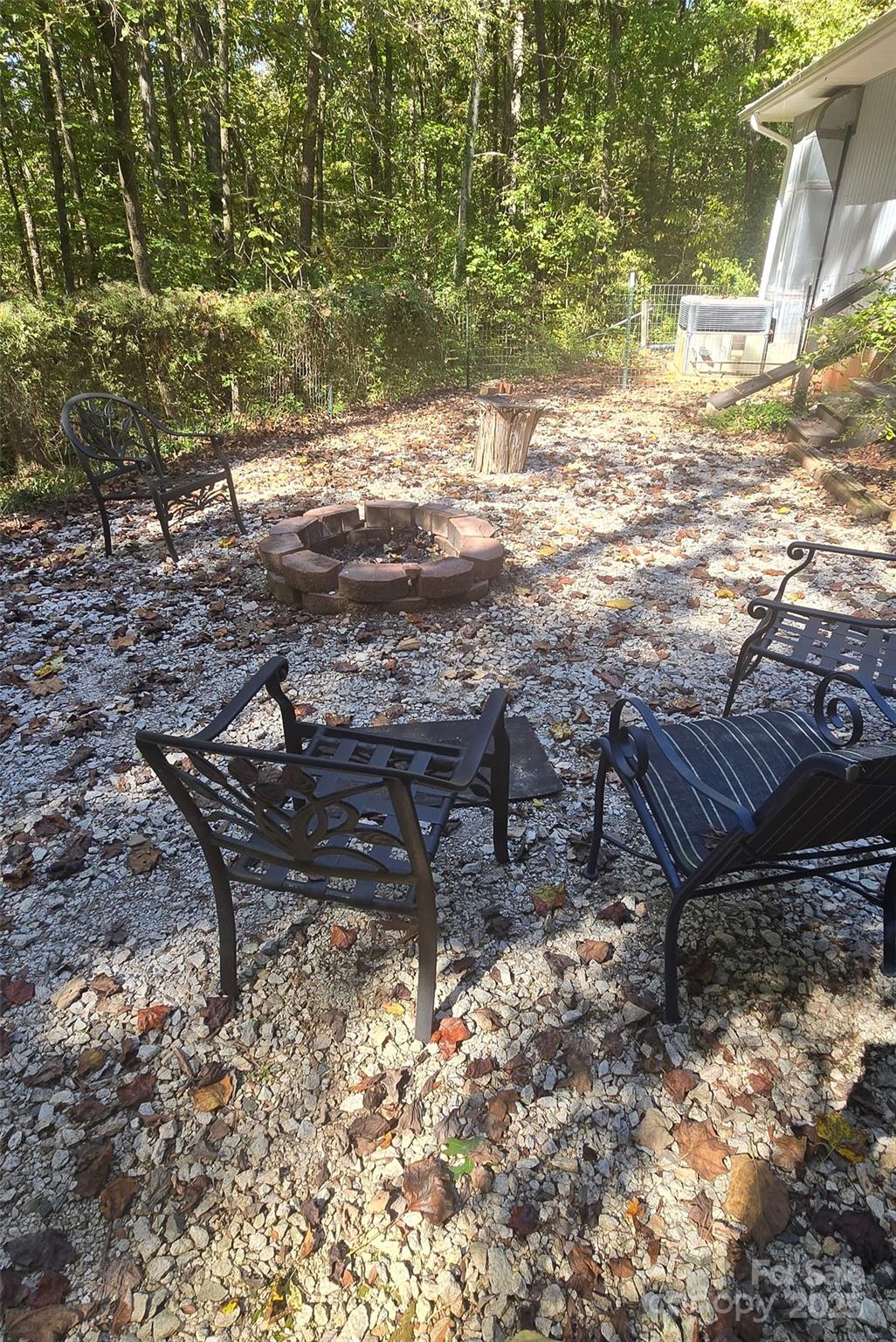 7827 Walkup Road Waxhaw, NC 28173 - Photo 4 of 4 a view of a yard with wooden fence