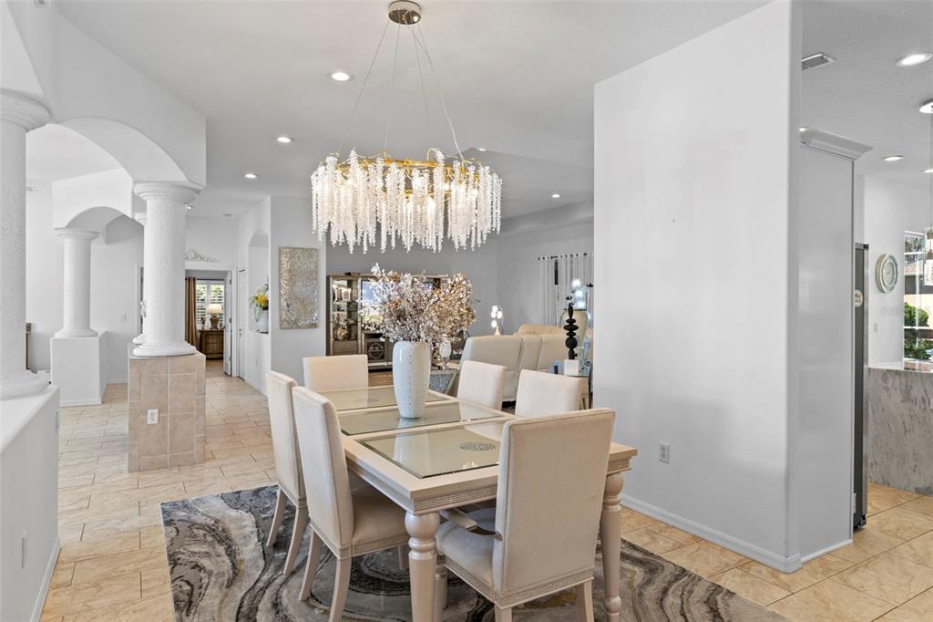 4061 Misty View Drive Spring Hill, FL 34609 - Photo 16 of 70 a view of a dining room with furniture