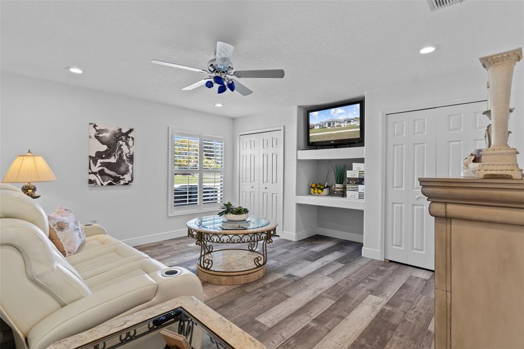 4061 Misty View Drive Spring Hill, FL 34609 - Photo 49 of 70 a living room with furniture and a window