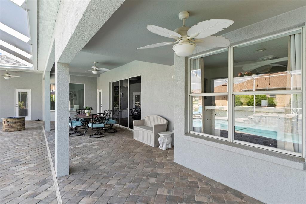 4061 Misty View Drive Spring Hill, FL 34609 - Photo 51 of 70 a lobby with furniture and floor to ceiling window