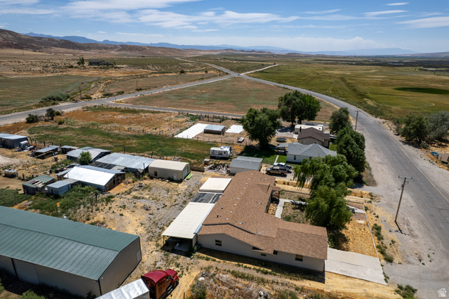 445 South Main Street Fayette, UT 84630 - Photo 12 of 45 Aerial view of sparsely populated area featuring a mountainous background and nearby suburban area