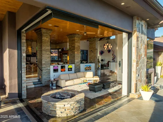 a bathroom with a granite countertop sink toilet a mirror and shower