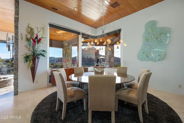 a view of a balcony with furniture and a patio
