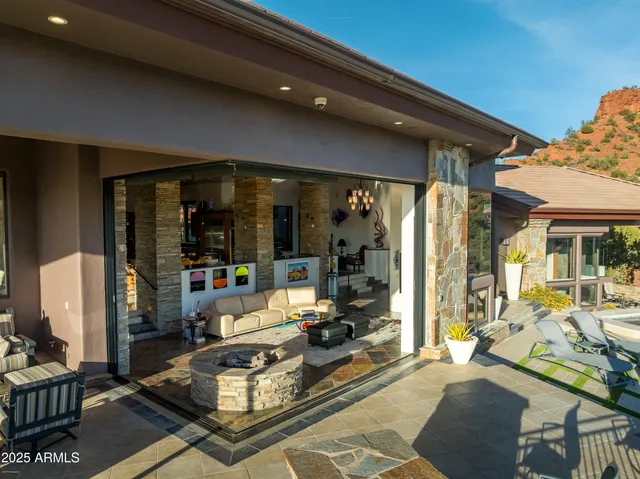 a bedroom with a bed and a night stand