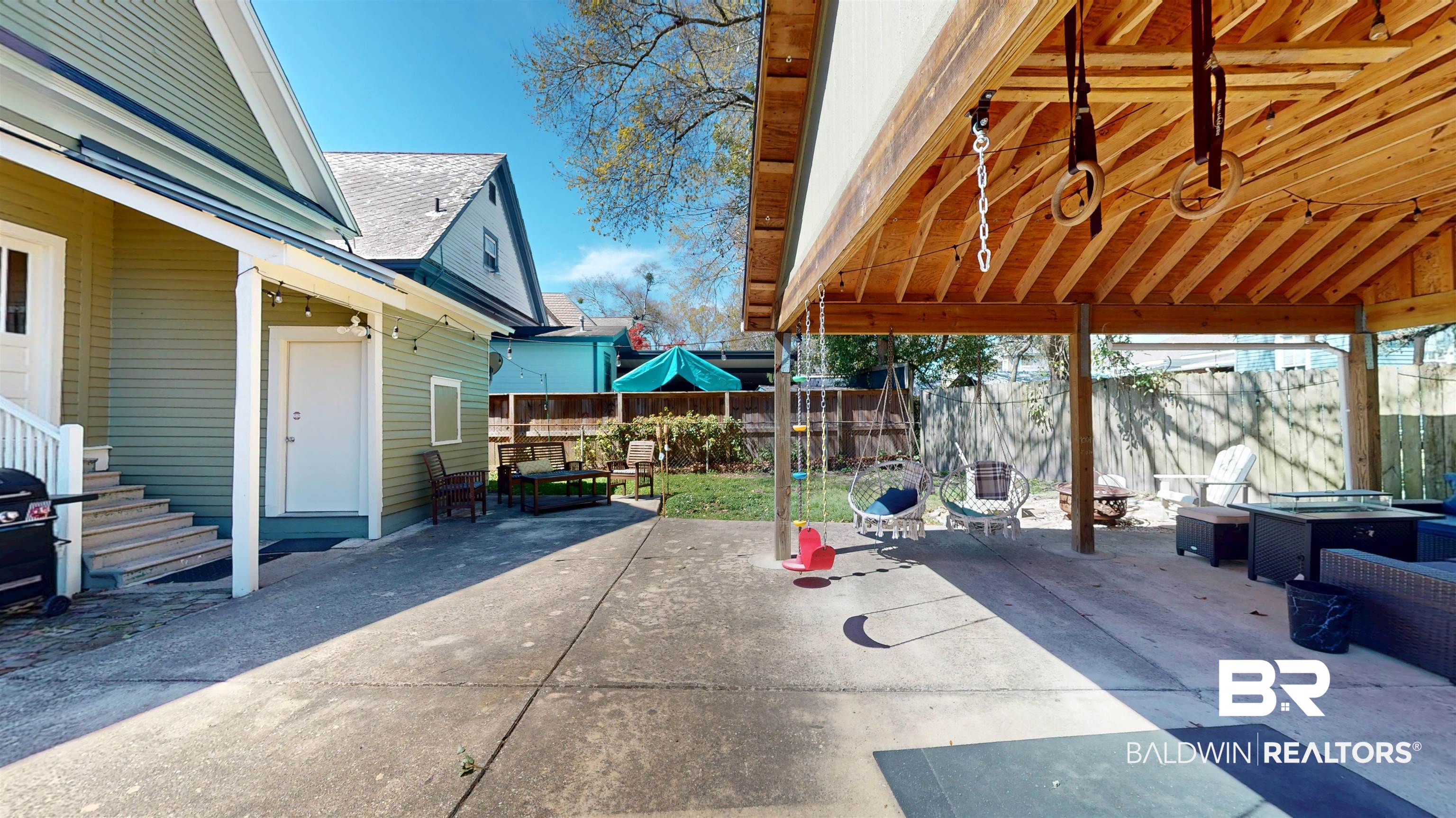 1154 New St Francis Street Mobile, AL 36604 - Photo 7 of 37 View of patio featuring fence