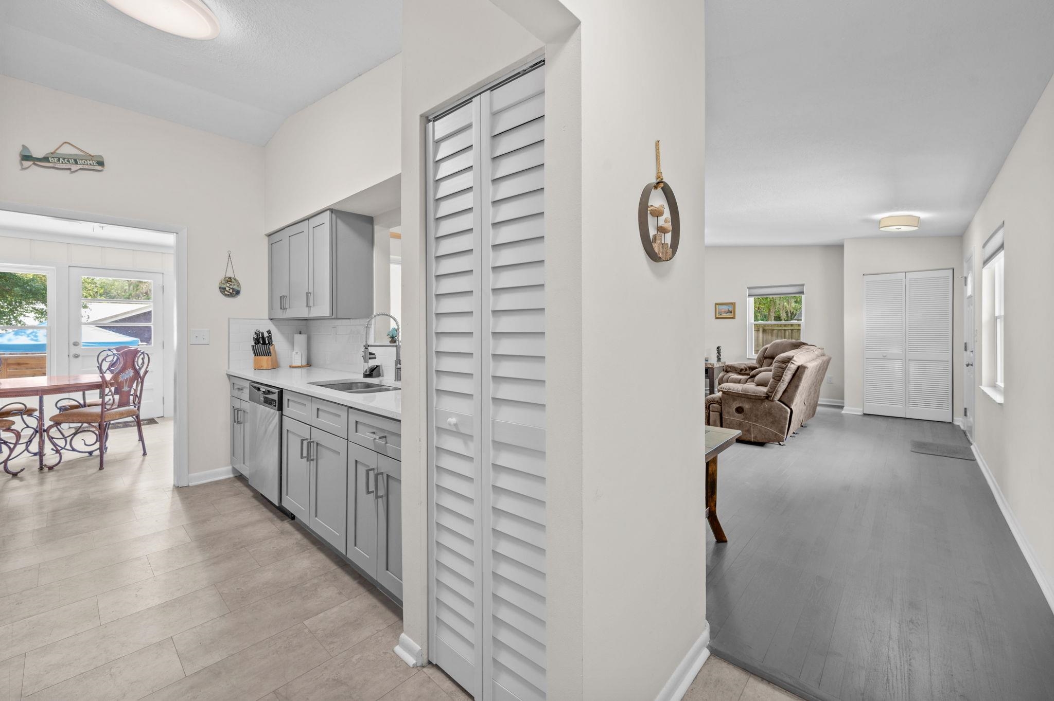 507 Gentian Road St. Augustine, FL 32086 - Photo 11 of 82 a large white kitchen with cabinets and furniture