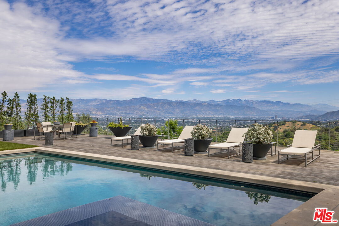 3337 Beverly Ranch Road Beverly Hills, CA 90210 - Photo 6 of 36 a view of swimming pool with a lounge chair