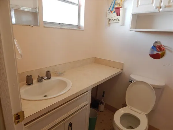a bathroom with a sink and a toilet