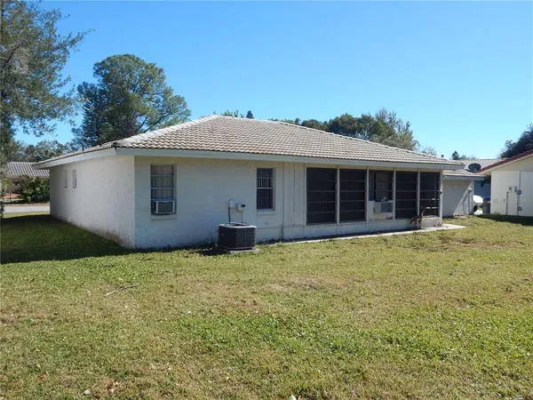 a house with trees in front of it