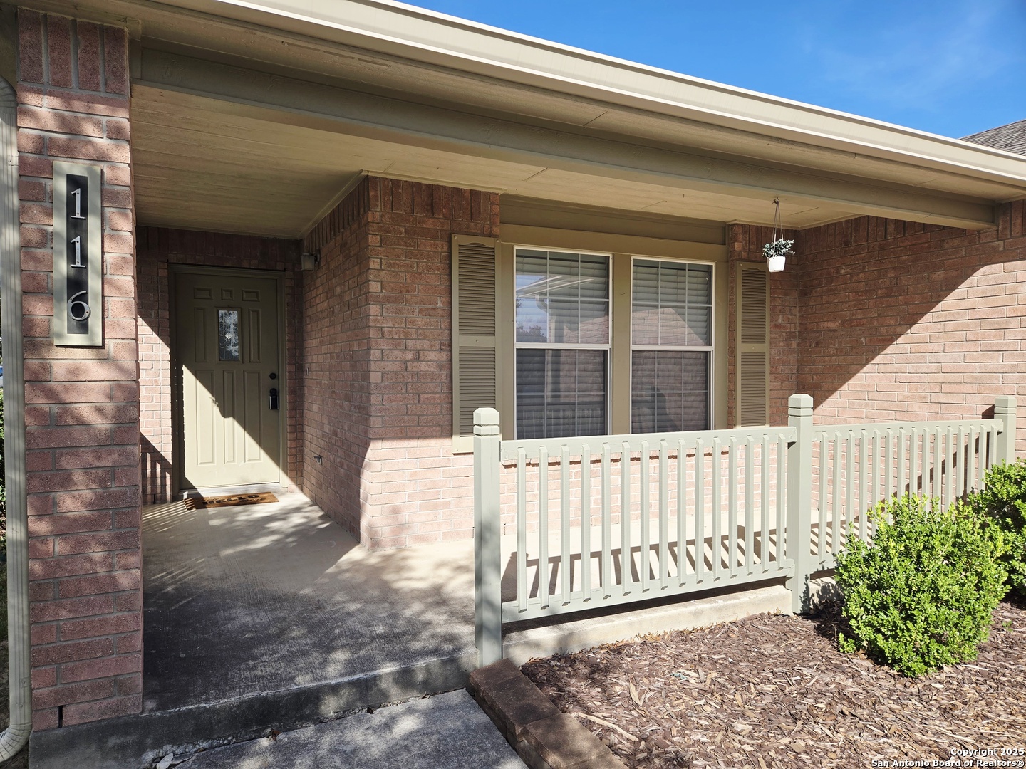 116 Tower Cibolo, TX 78108 - Photo 1 of 1 a view of a porch with a floor to ceiling window and potted plants
