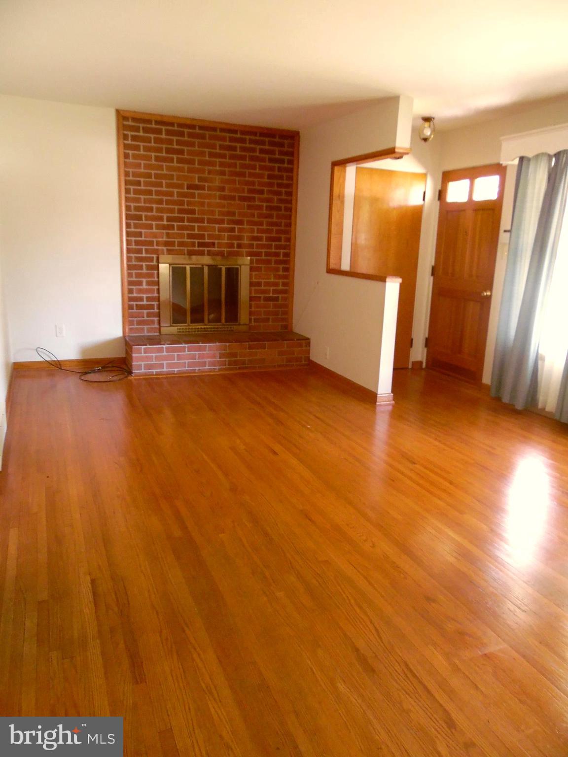 12406 Gramlich Road Southwest Cumberland, MD 21502 - Photo 11 of 48 Come in & get warm with this fireplace.