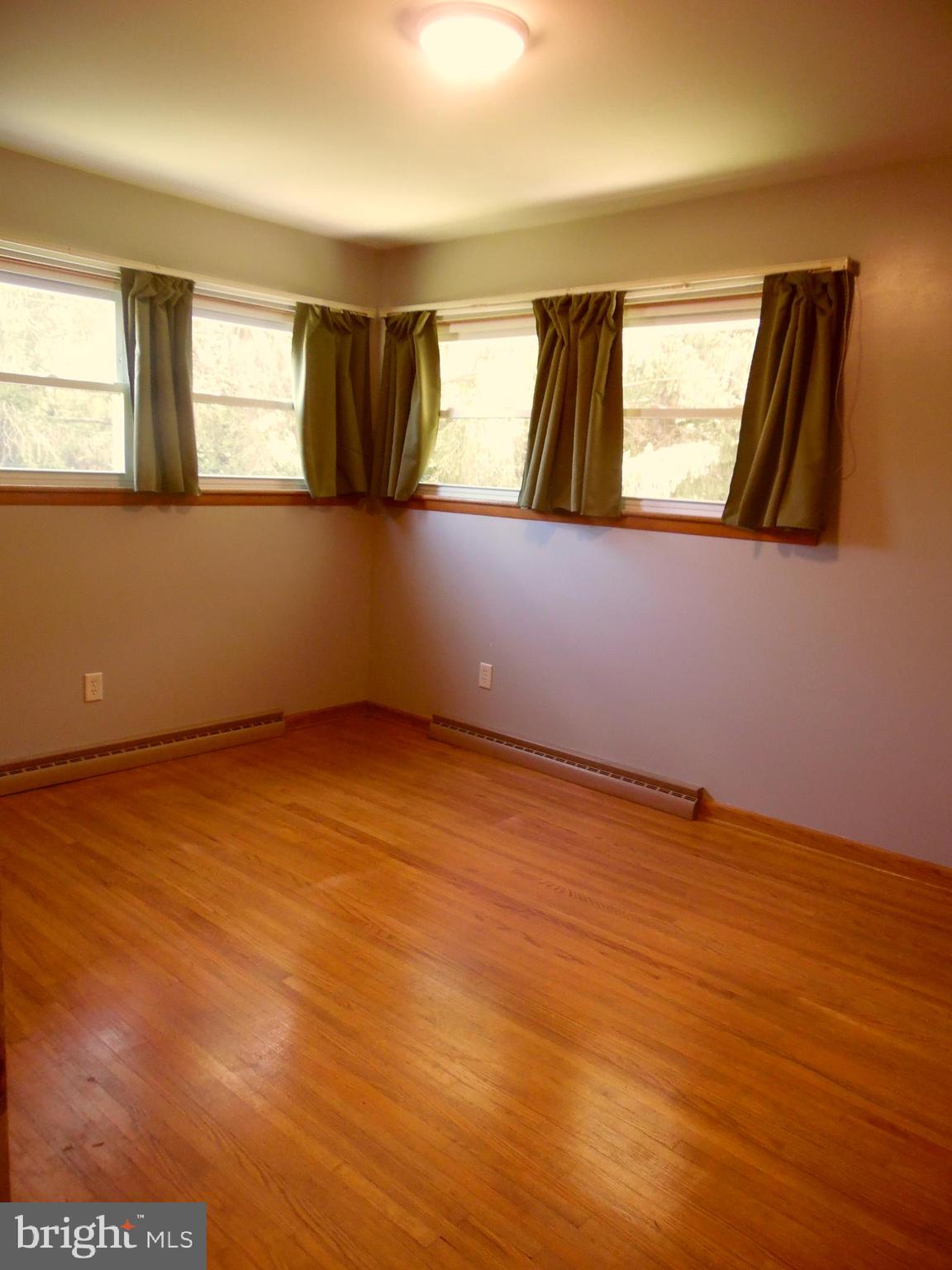12406 Gramlich Road Southwest Cumberland, MD 21502 - Photo 21 of 48 Bed #1 Lots of light and hardwood floors
