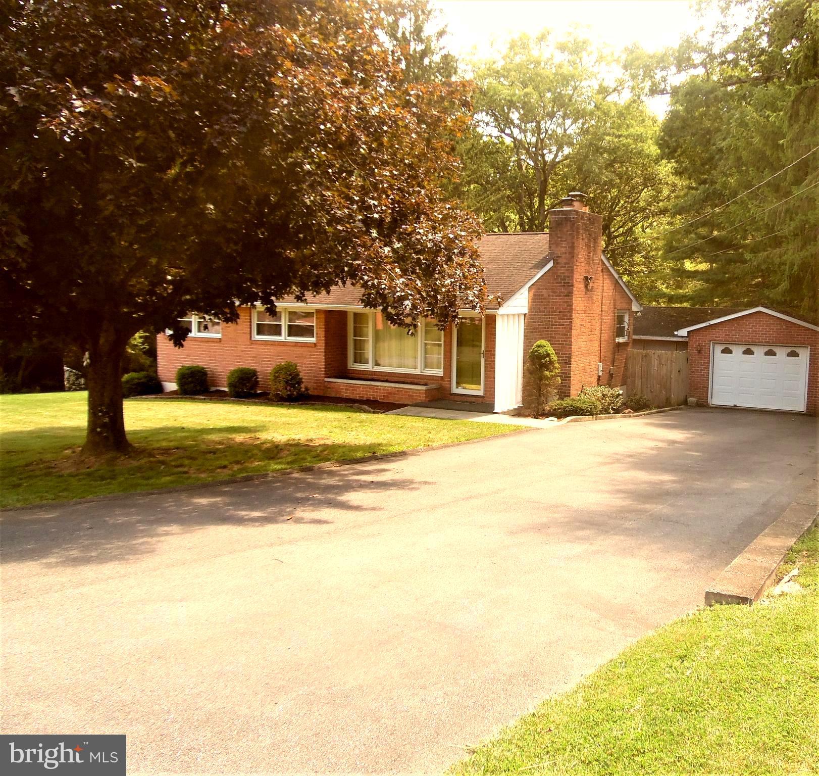 12406 Gramlich Road Southwest Cumberland, MD 21502 - Photo 6 of 48 A large paved driveway for your friends and family