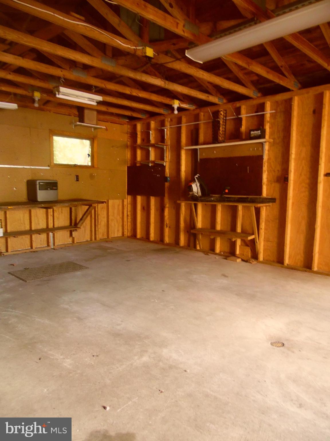 12406 Gramlich Road Southwest Cumberland, MD 21502 - Photo 10 of 48 Garage with added work space/storage.