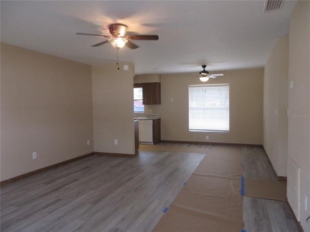 2601 Southeast 175th Terrace Road Silver Springs, FL 34488 - Photo 18 of 87 a view of an empty room with a window