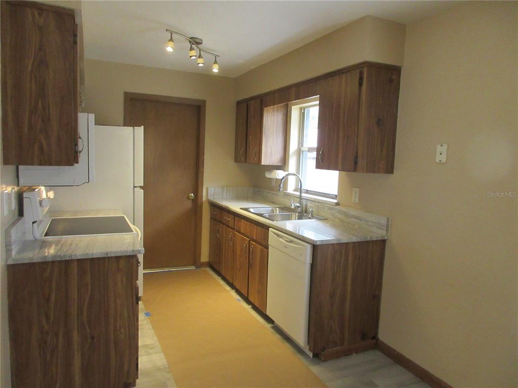 2601 Southeast 175th Terrace Road Silver Springs, FL 34488 - Photo 24 of 87 a bathroom with a granite countertop sink and a mirror