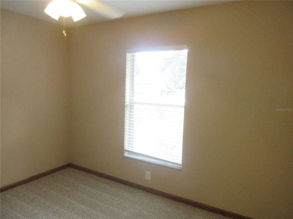 2601 Southeast 175th Terrace Road Silver Springs, FL 34488 - Photo 40 of 87 an empty room with a window